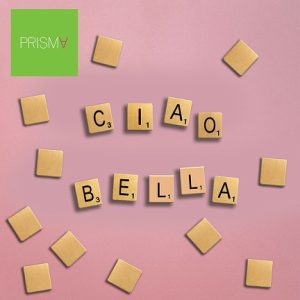 We translate into Italian. Scrabble letters spelling: Ciao Bella.
