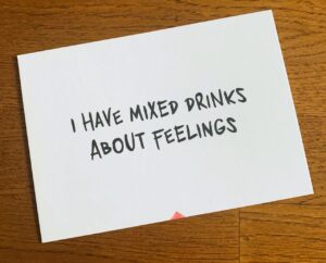 TEXT: "I have mixed drinks about feelings". It highlights the importance of Proof-reading.